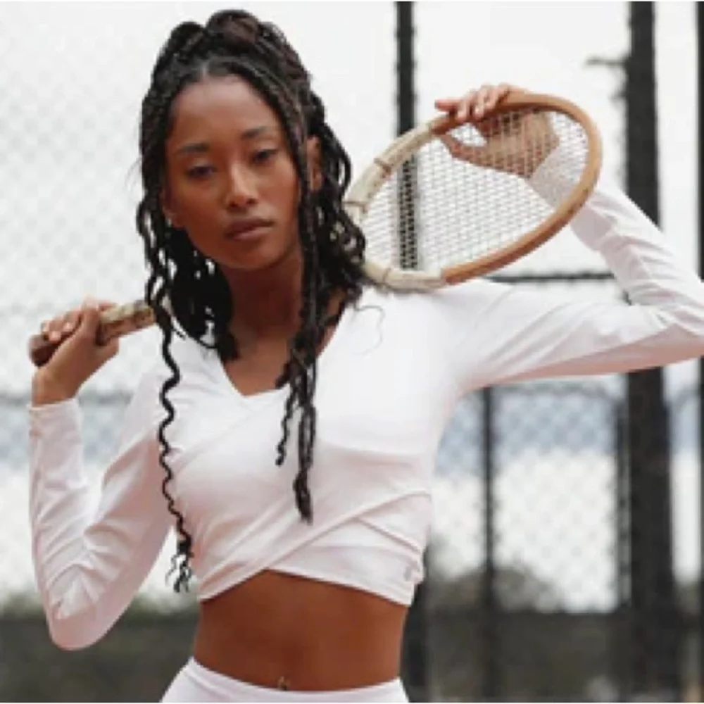 ELEVEN BY VENUS WILLIAMS x Revolve Power Long Sleeve Top in White